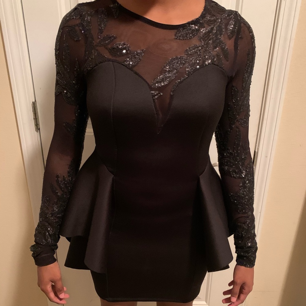 A black sequins dress.